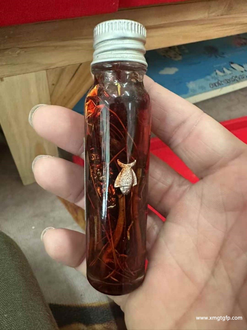 阿赞迪猜 招财桃花拍罂油2.jpg